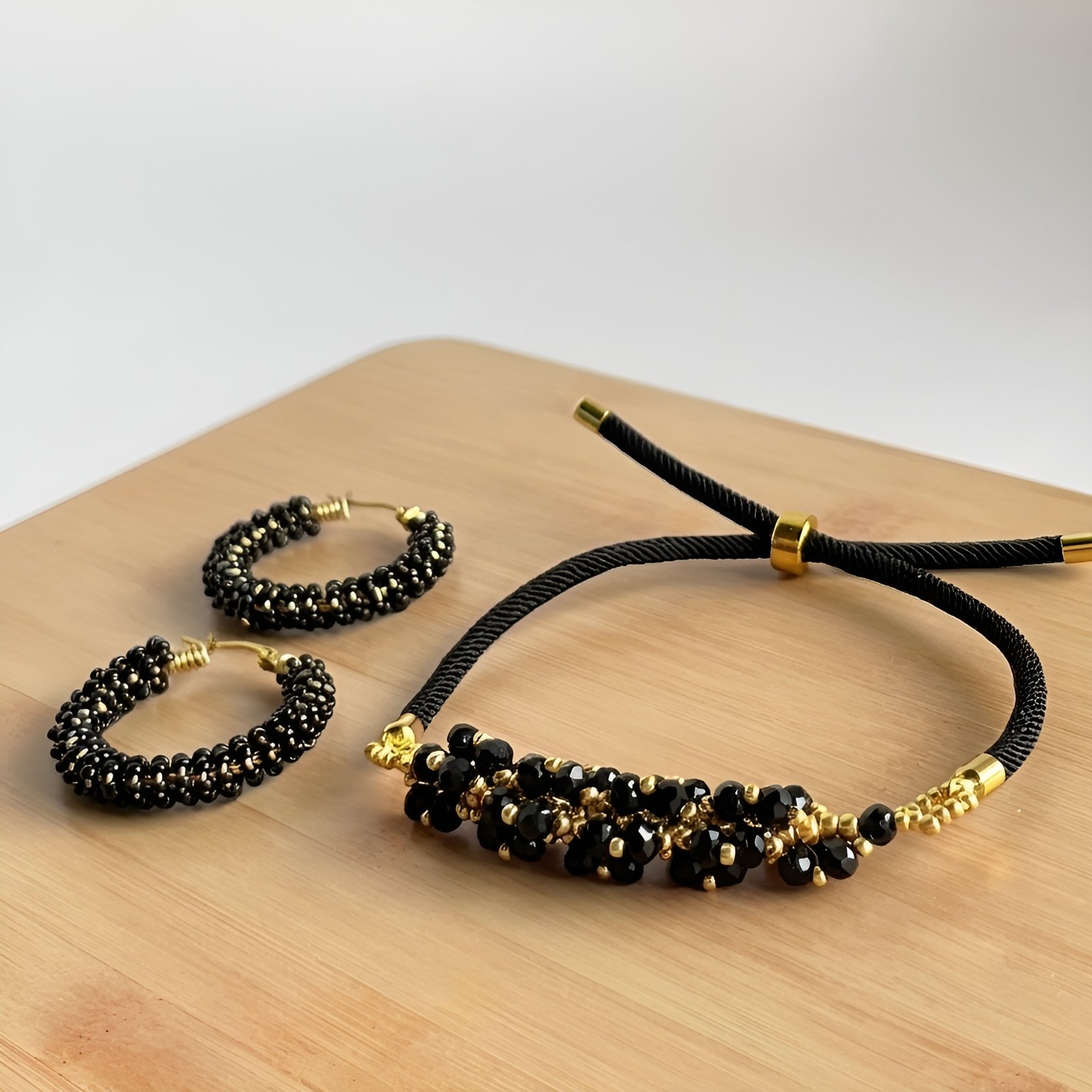 set-pulsera-arete-candonga-negro-01