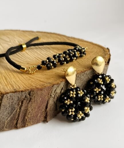 Set de pulsera y aretes colgantes en cristal negro