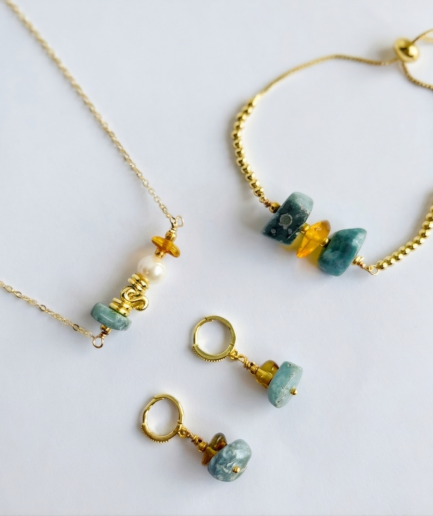 Set de collar barra, pulsera y aretes en larimar y ámbar